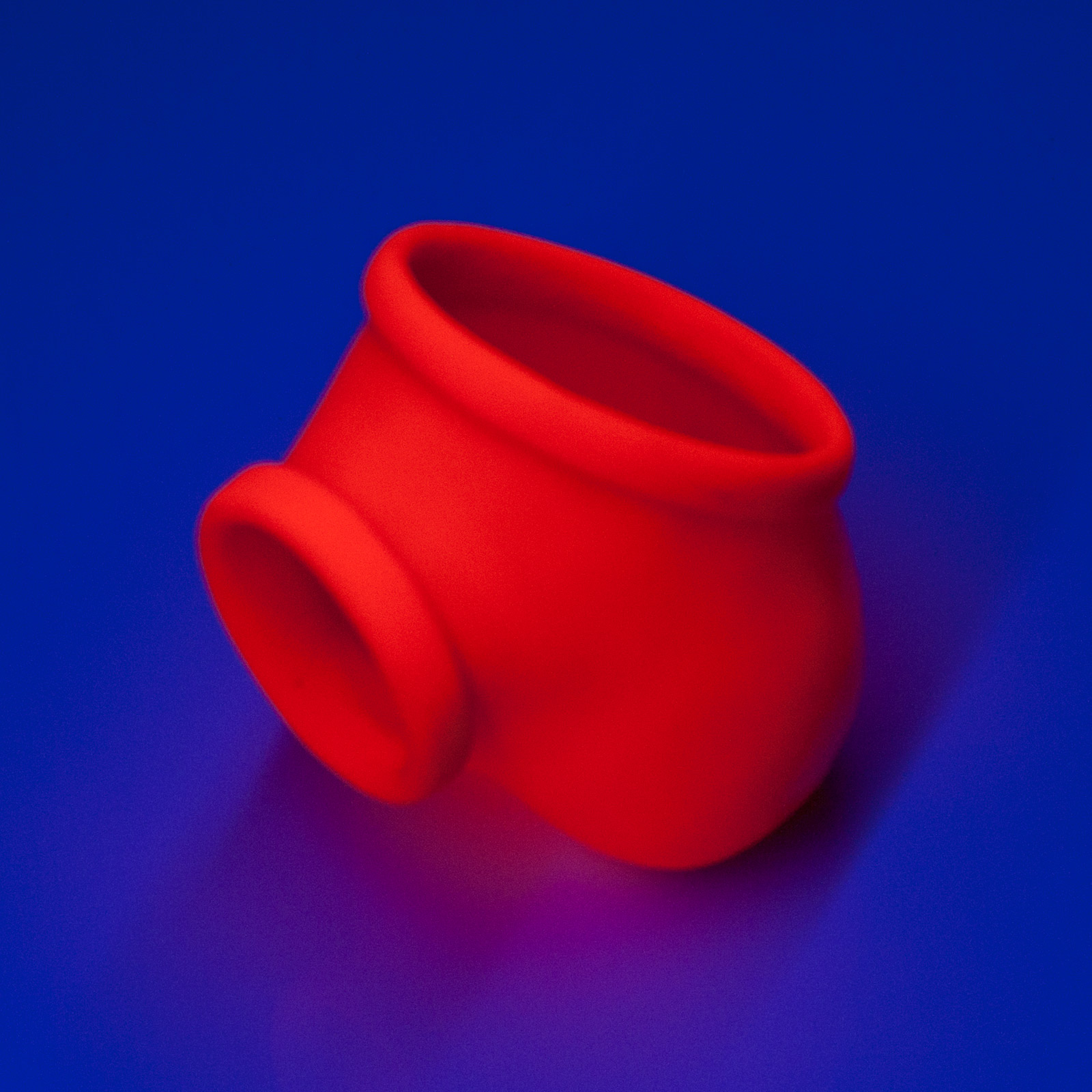 Toylie Latex Penis Sleeve «BEN» neon orange (glow effect), without shaft, with penis ring and molded scrotum