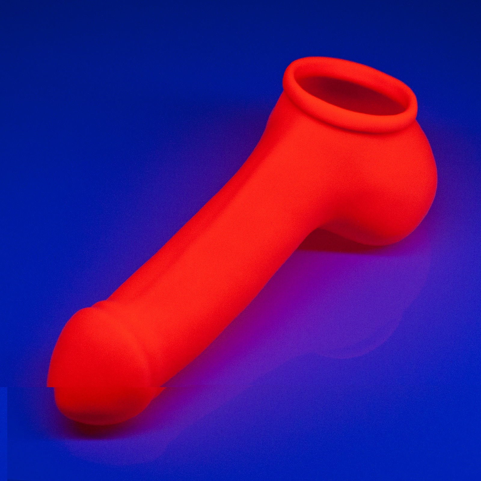 Toylie Latex Penis Sleeve «ADAM 4.5» neon orange (glow effect), with molded glans and scrotum